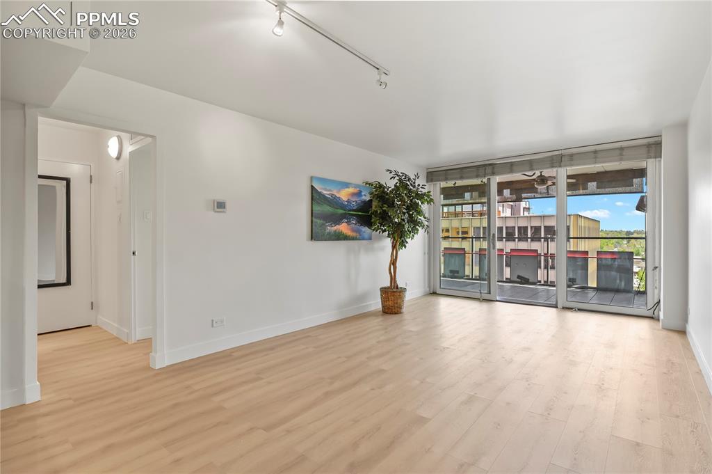 Image 13 of 30: floor to ceiling windows make this bright and beautiful