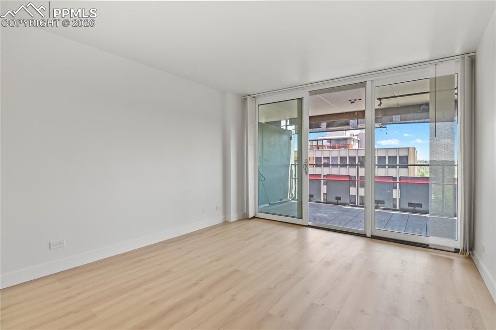 Image 18 of 30: This large bedroom will easily fit a king size bed