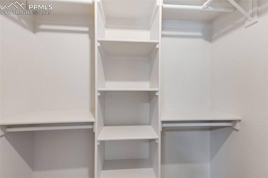 Image 19 of 47: Primary Walk-in Closet
