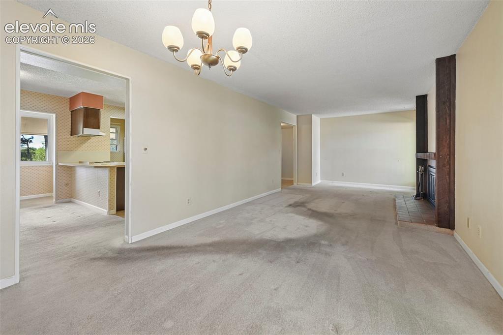 Image 7 of 24: Dining area off kitchen opens to Living Room