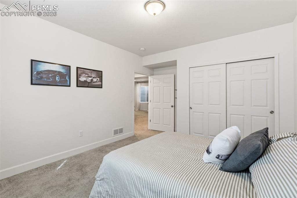 Image 24 of 30: Bedroom