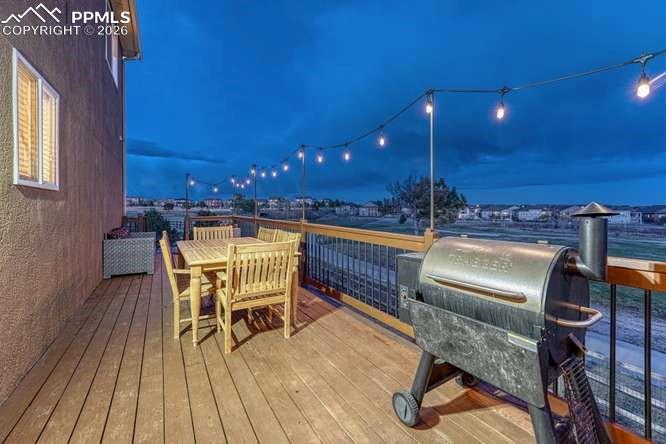 Image 32 of 44: Large Deck overlooking the golf course.