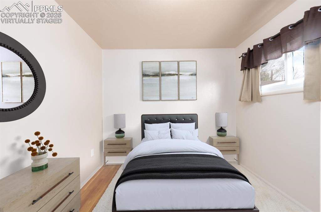 Image 12 of 34: Bedroom 1 virtually staged