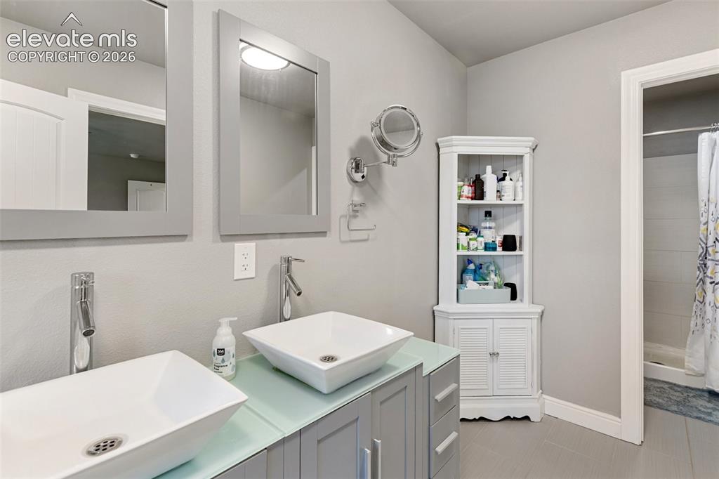 Image 10 of 30: Master Bathroom
