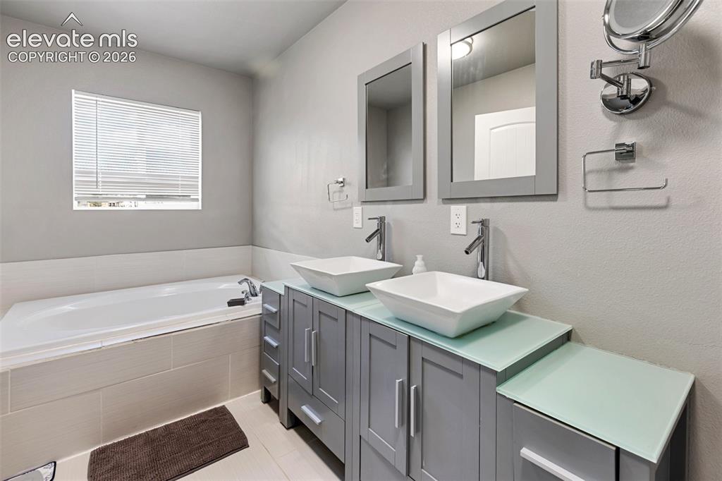Image 11 of 30: Master Bathroom