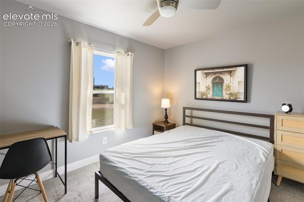 Image 13 of 30: Main level bedroom