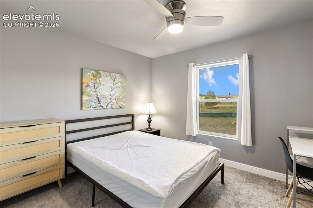 Image 14 of 30: Main level bedroom