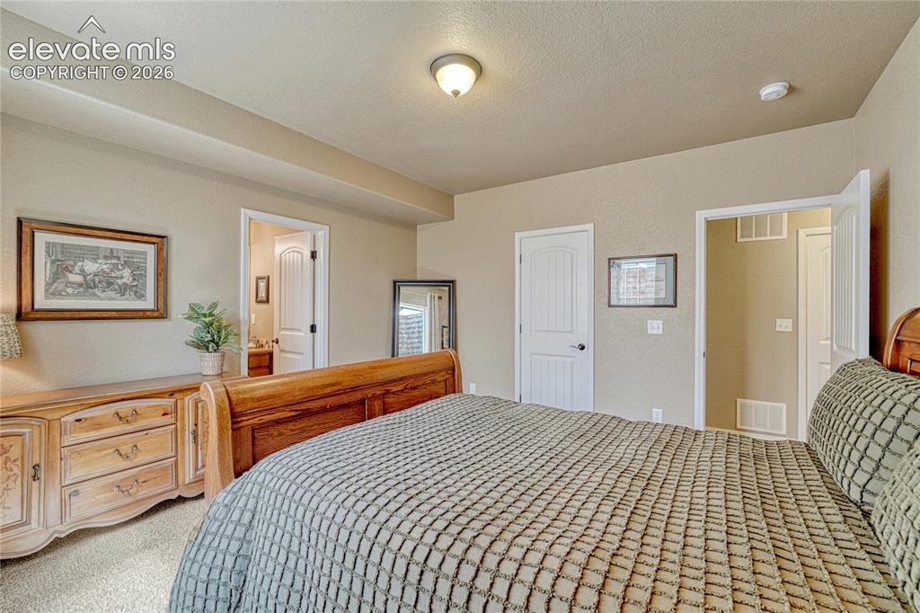 Image 31 of 50: Finished basement offers three additional bedrooms