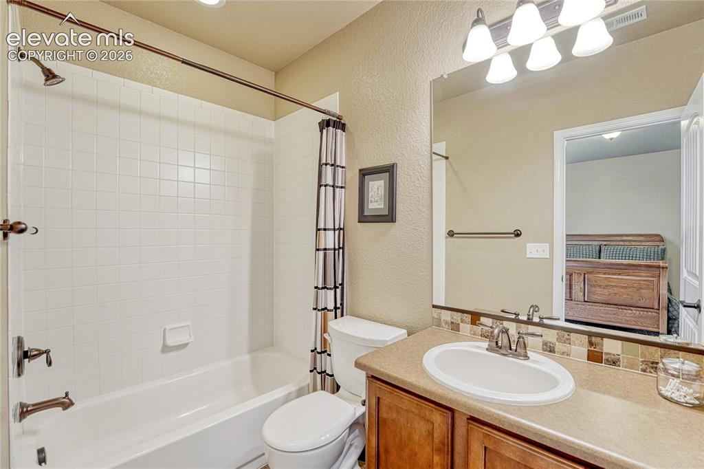 Image 35 of 50: Full bath prefectly located in the basement