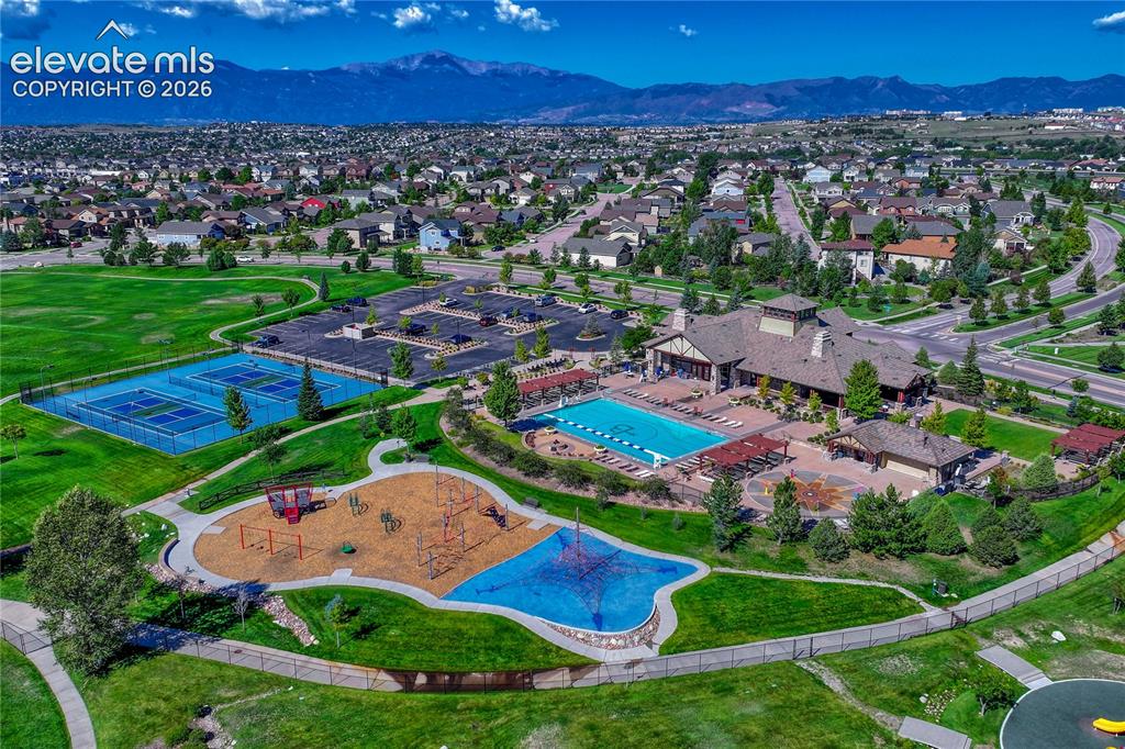 Image 47 of 50: Community amenities include a clubhouse, fitness center, swimming and water