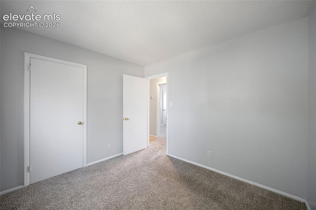 Image 15 of 27: Master Bedroom