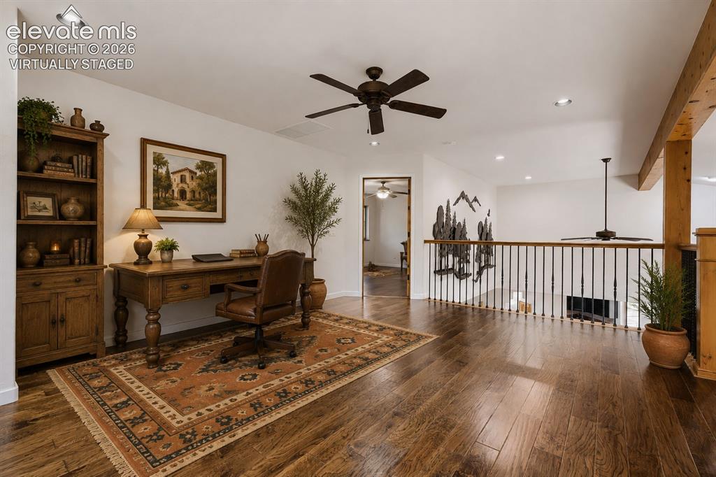 Image 28 of 50: Virtually staged primary retreat area or loft