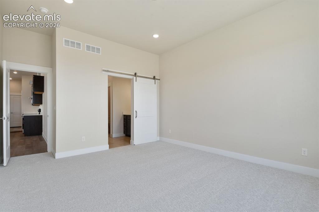 Image 32 of 43: Master Bedroom