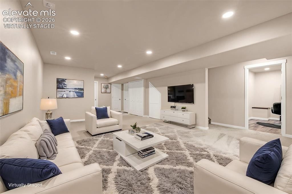 Image 33 of 44: Family Room in Basement Virtually Staged