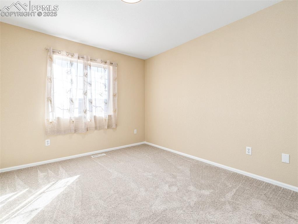 Image 23 of 37: Bedroom