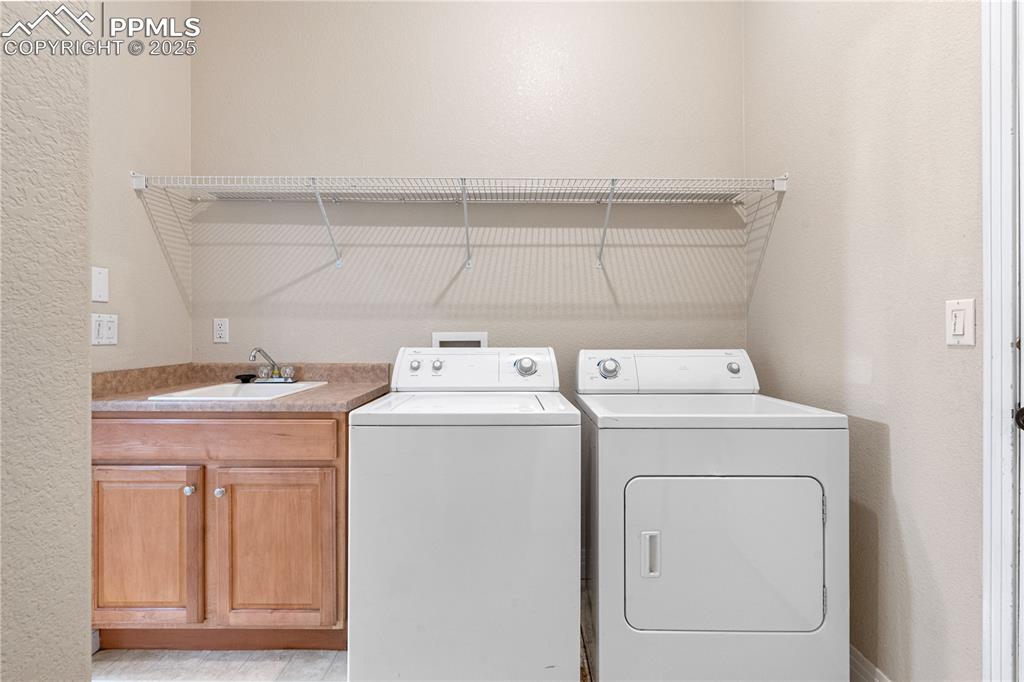 Image 28 of 47: Main level laundry