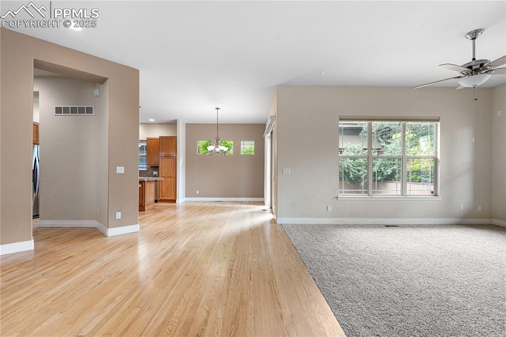 Image 9 of 47: Foyer, living room, dining room