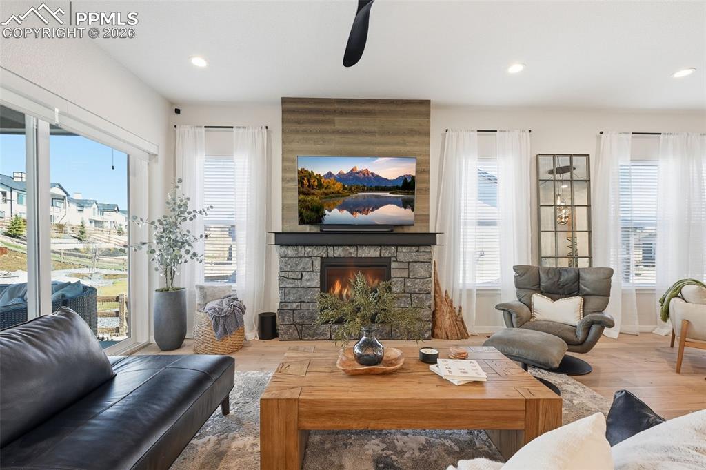 Image 12 of 46: Stunning fireplace with mantle