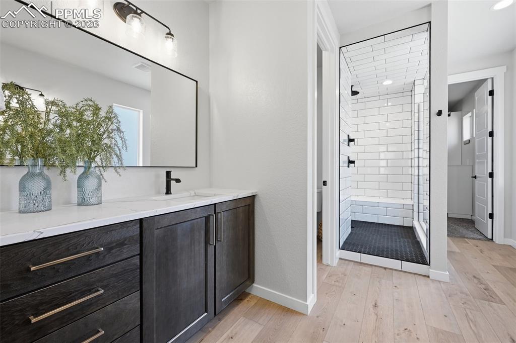 Image 23 of 46: Large Master Bath with separate vanities