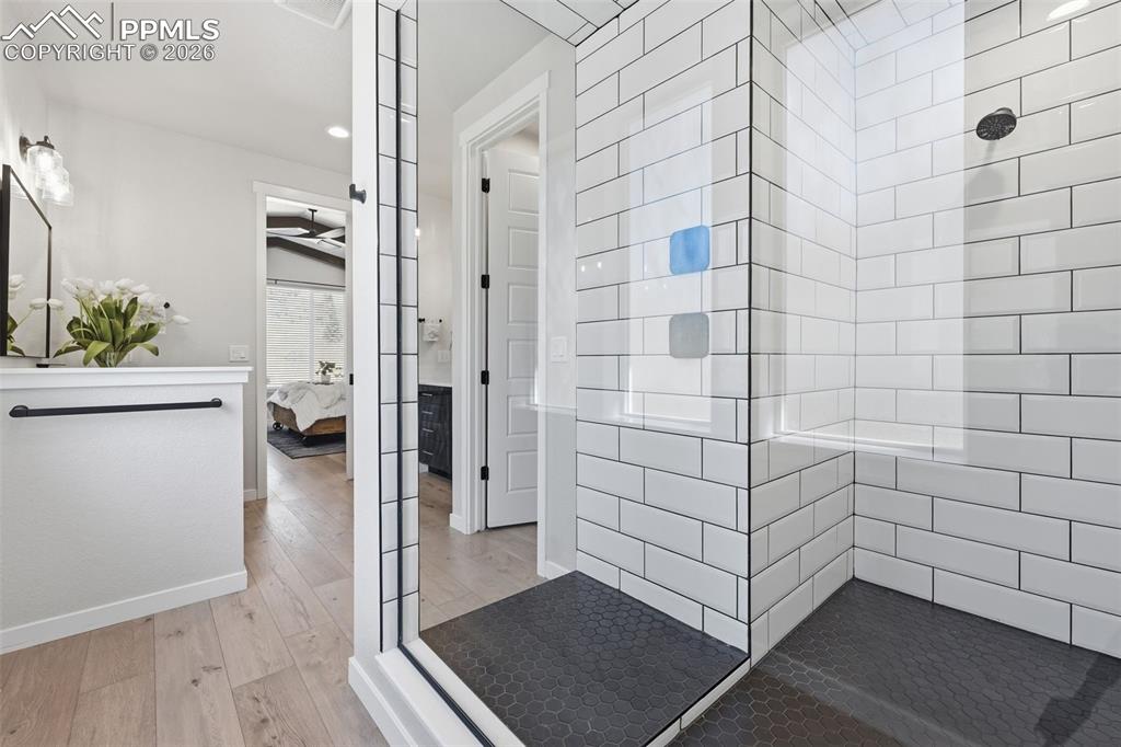 Image 25 of 46: Huge walk in shower with upgraded tile