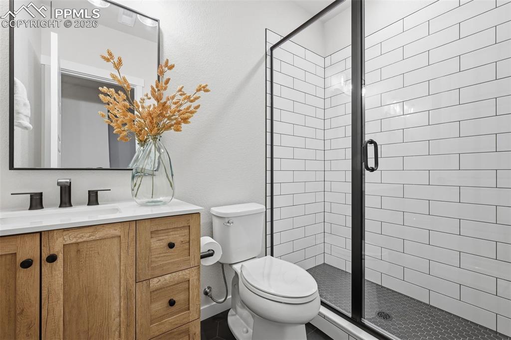 Image 41 of 46: Junior Master Bathroom with walk-in shower