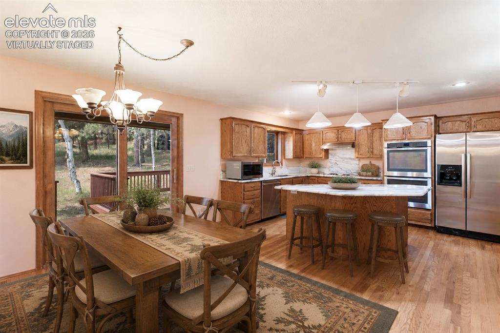 Image 6 of 38: Living and Dining Room