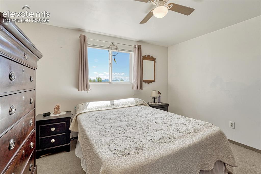 Image 14 of 50: Main level bedroom