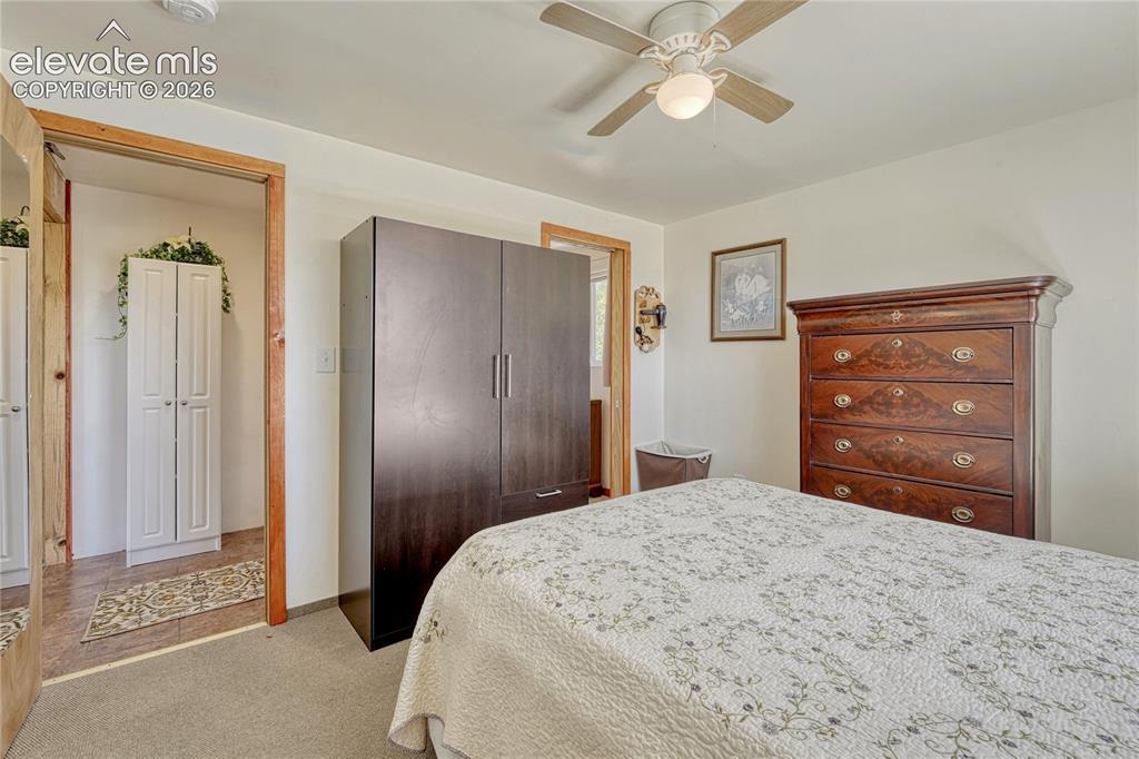 Image 15 of 50: Main level bedroom