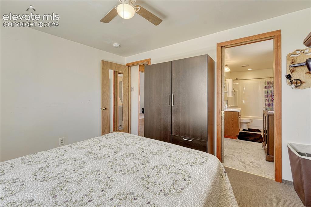 Image 16 of 50: Main level bedroom