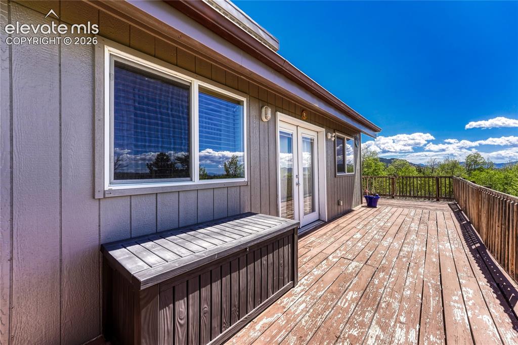 Image 28 of 50: Wrap around porch with views