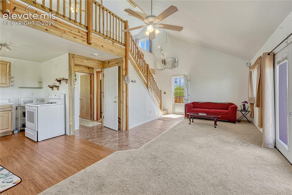Image 8 of 50: Living room and kitchen