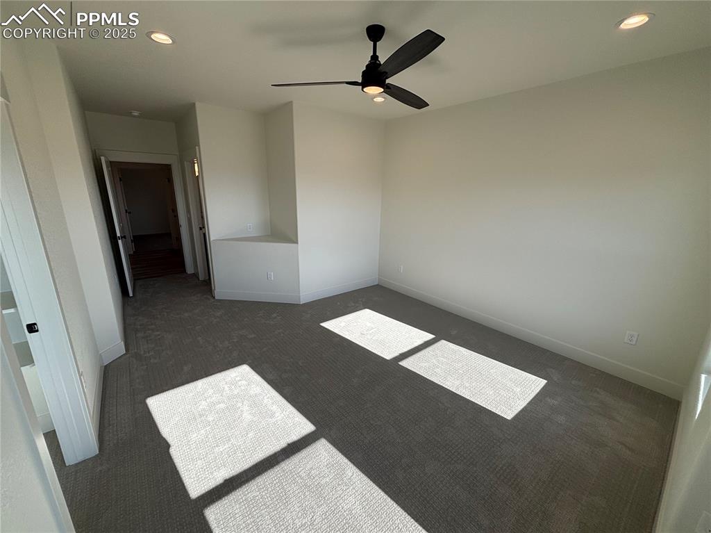 Image 15 of 19: Carpeted spare room featuring recessed lighting and a ceiling fan