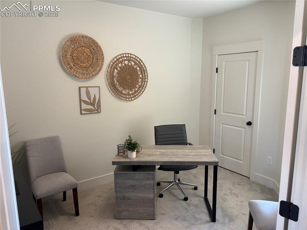 Image 2 of 19: Office space with light carpet and baseboards