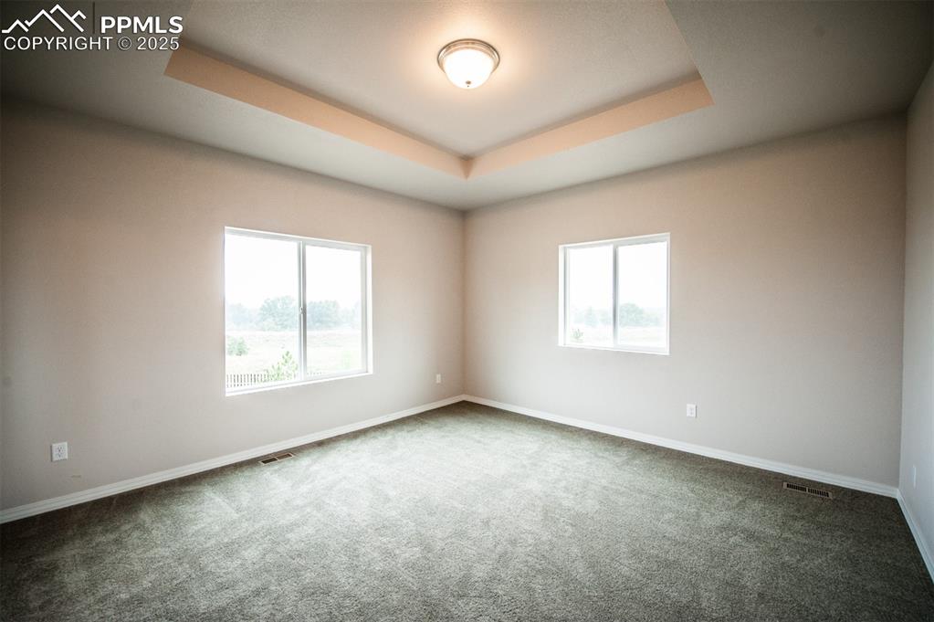 Image 10 of 29: Master Bedroom