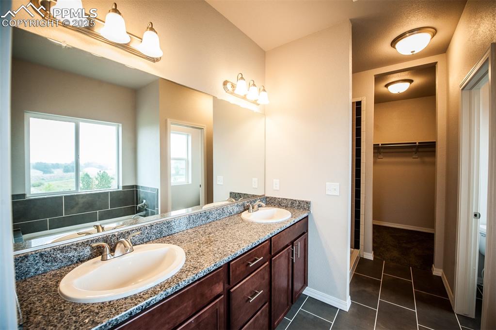 Image 12 of 29: 5-Piece primary bathroom
