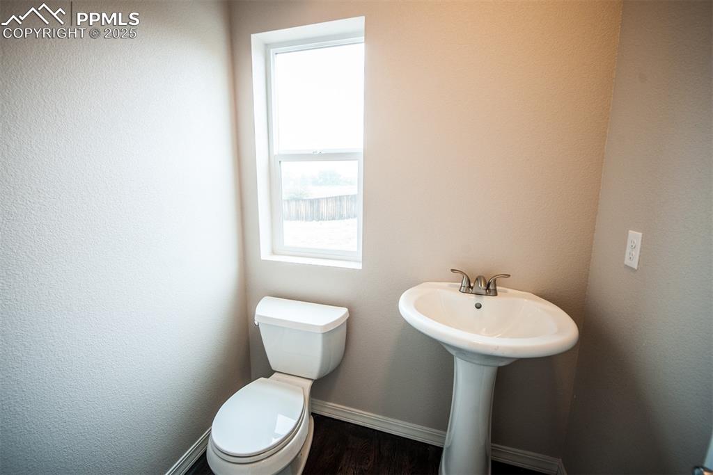 Image 22 of 29: Half bath on main level