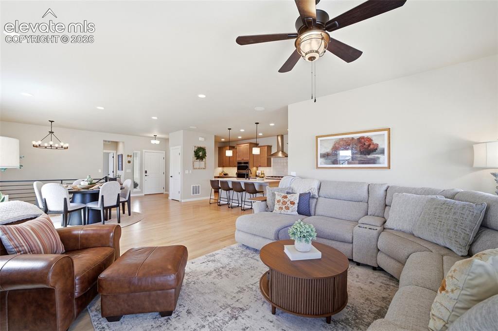 Image 16 of 49: Main floor plan flows yet has designated spaces.
