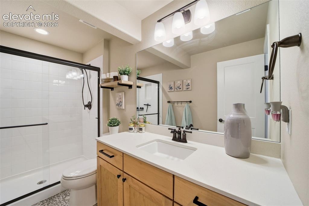 Image 35 of 49: Full bathroom in the basement.