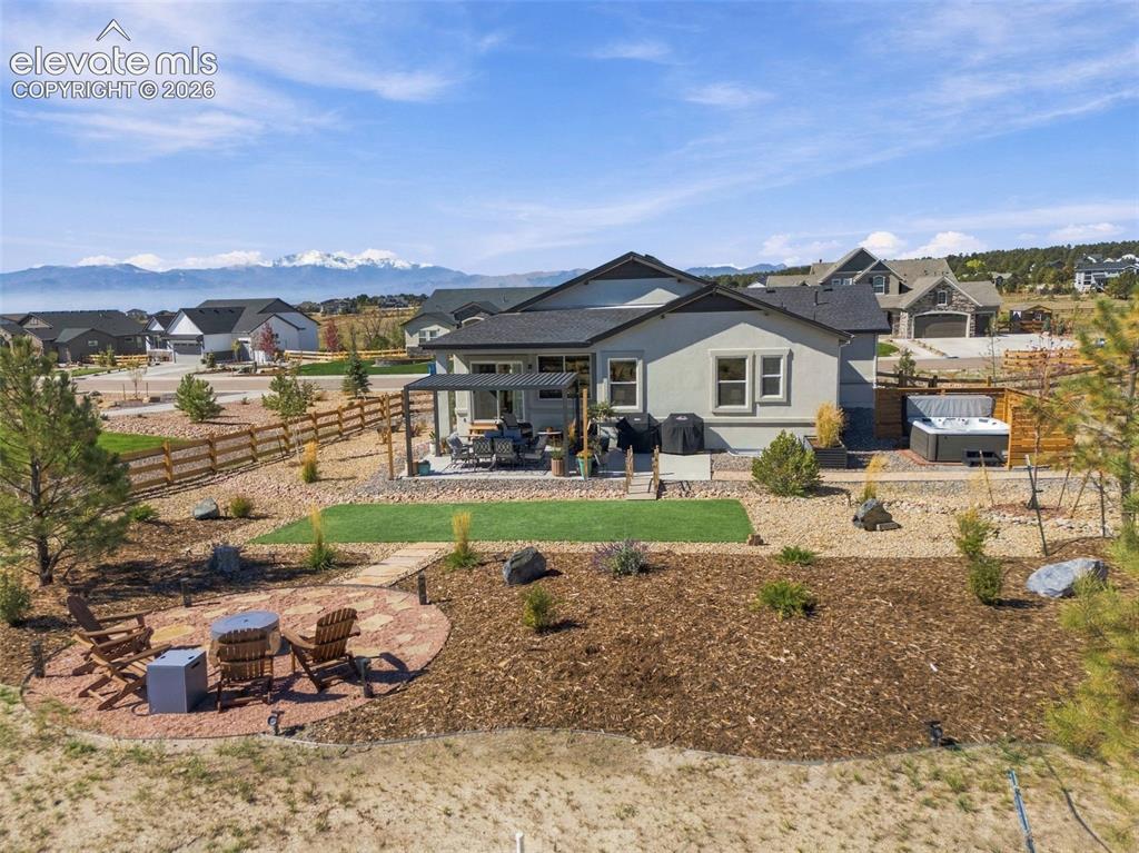 Image 43 of 49: The kind of backyard that makes you suddenly very interested in outdoor liv