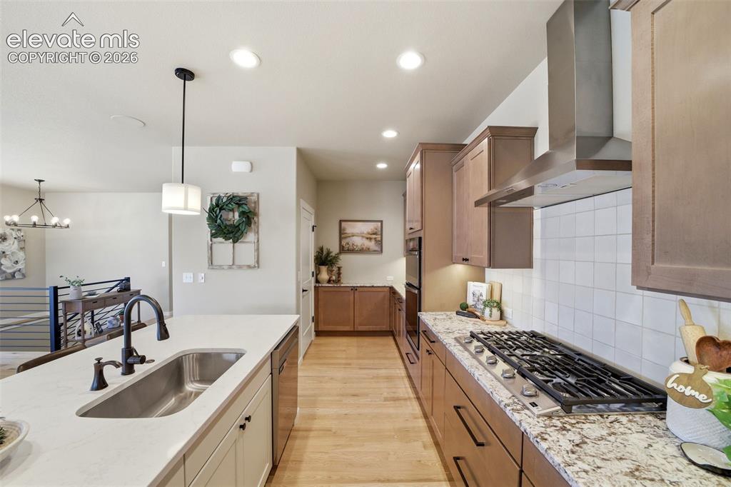 Image 9 of 49: Counter space for cooking…and unnecessary kitchen appliances.