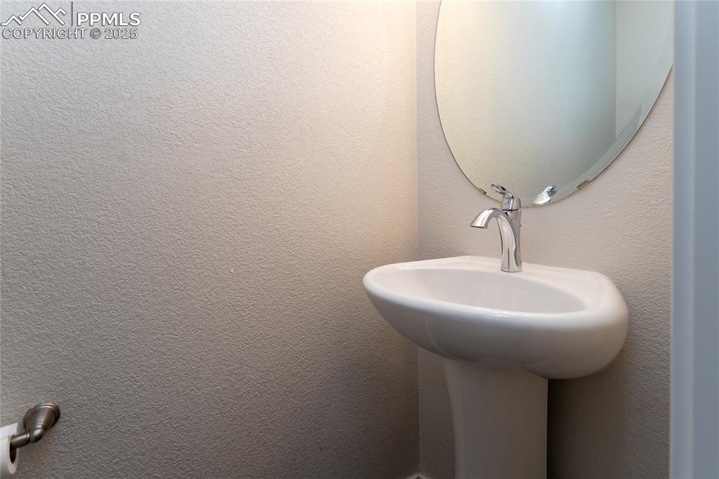 Image 11 of 50: Main level half-bath