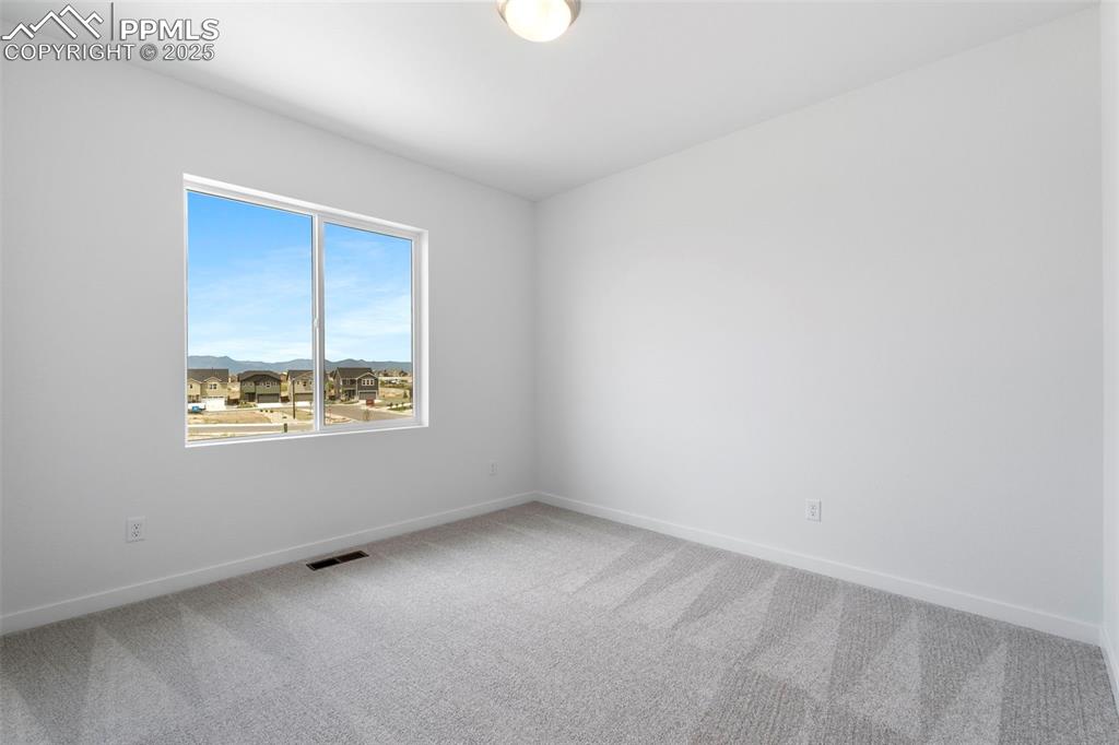 Image 25 of 37: Bedroom