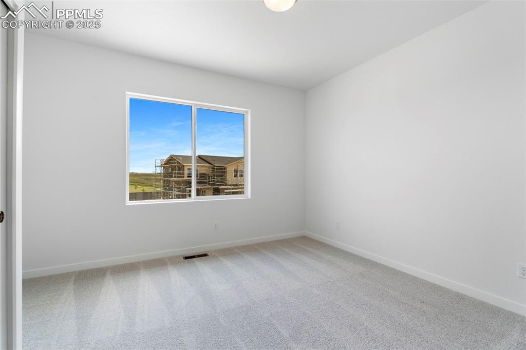 Image 27 of 37: Bedroom