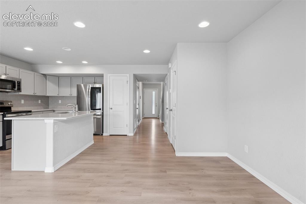 Image 10 of 36: The spacious Living Room is ready for you to make memories to enjoy for yea