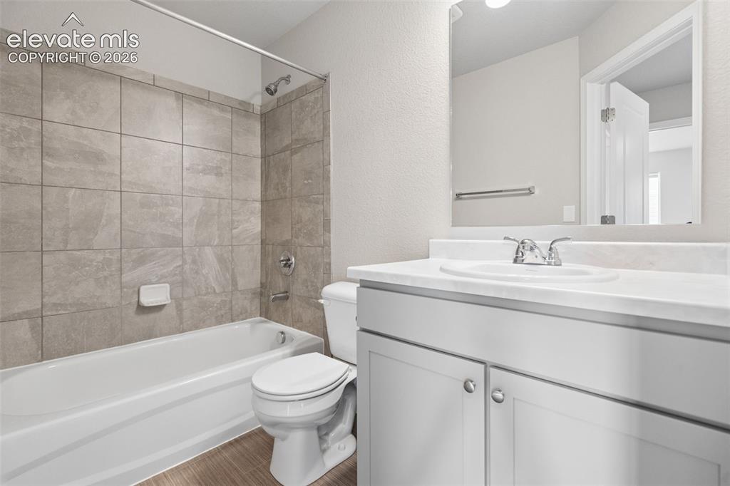 Image 31 of 36: The upper level has a full bathroom separate from the Primary Bedroom!