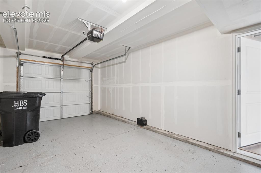 Image 33 of 36: The home has an attached, 1-car garage!