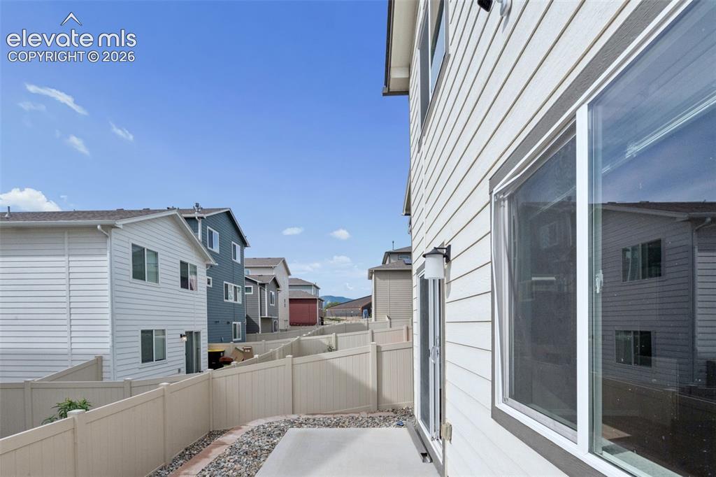 Image 34 of 36: The backyard has a patio and space to enjoy pastimes from such as gardening