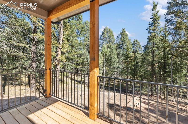 Image 33 of 37: View of back yard from Covered Deck off the laundry room.