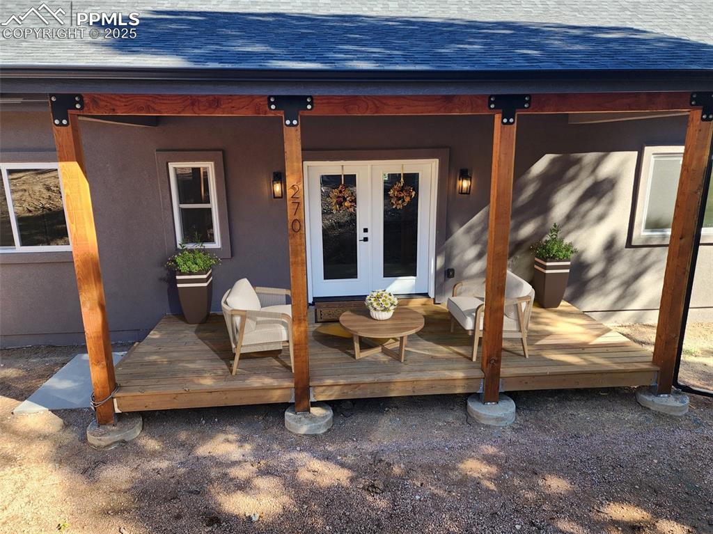 Image 36 of 37: Beautiful front Entry. A Great Place to relax & breath in the fresh mountai