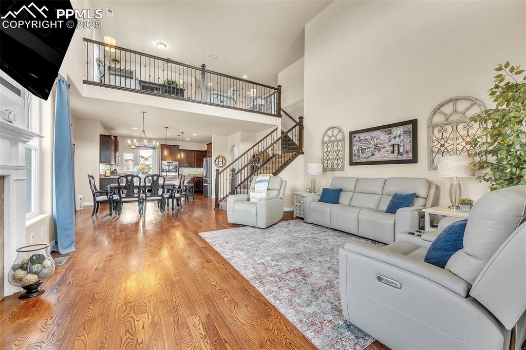 Image 2 of 40: Grand entryway with loft above